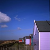 Beach Huts at Sutton by Trevor Dingle